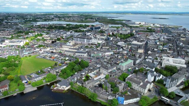 Aerial drone panning shot of the city of Galway and Corrib River, Ireland