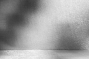 Blur shadow of leaves on white fabric. white cloth background soft wrinkled fabric patrem and surface