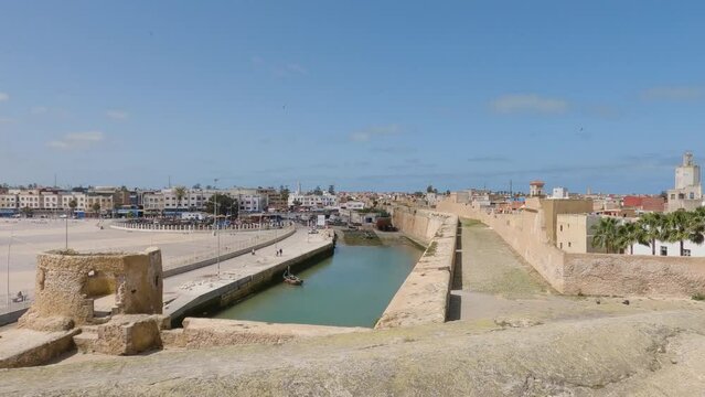 Pan Right View Across El Jadida Fortress Wall Overlooking Quai Darse In Morocco