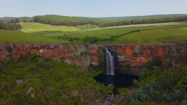 South Africa aerial drone Lisbon Berlin Falls waterfalls Sabie cinematic Kruger National Park partially cloudy sunny lush spring summer green stunning water landscape bush slowly circling movement