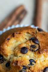 Cupcake with chocolate pieces, close up