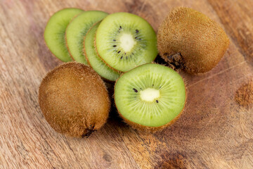 fresh green kiwi while cooking food in the kitchen