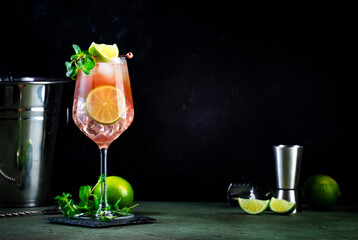 French mule, alcoholic cocktail drink with vodka, orange, lime, ginger beer, syrup, juice and ice...