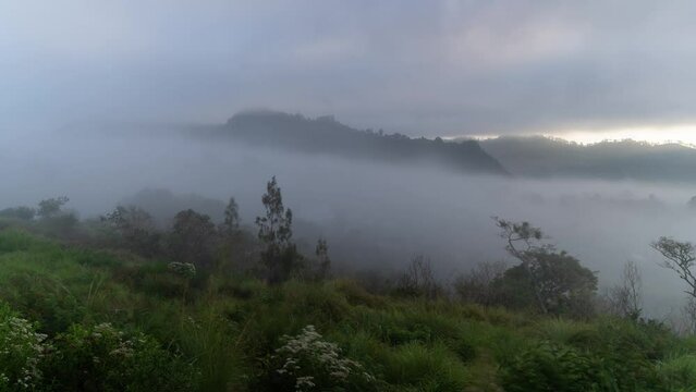 Time Lapse of Lake Batur Volcano Looking at Mount Abang in Kintamani Bali in The Morning