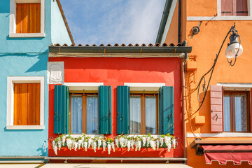 Fototapeta na wymiar Colorful houses on The Burano island near Venice, Italy, Europe.