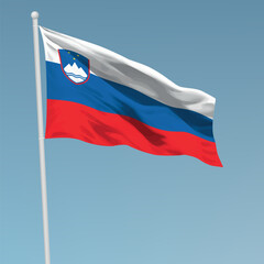 Waving flag of Slovenia on flagpole. Template for independence