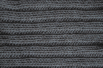Organic knit texture with macro woven threads.