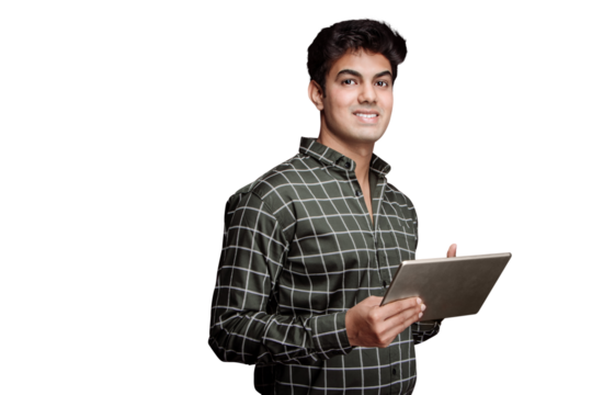 Handsome Young Man Using Tablet or Ipad looking at the camera Isolated on a PNG background.