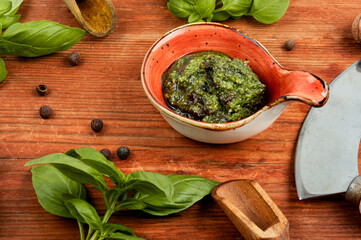 Homemade pesto sauce and ingredients.
