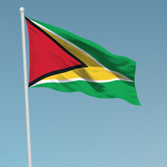 Fototapeta na wymiar Waving flag of Guyana on flagpole. Template for independence day