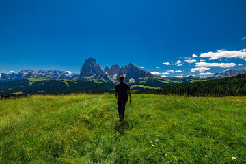 person walking in the mountains