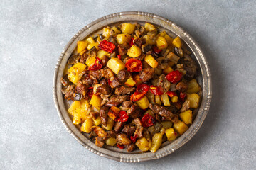 From Turkish cuisine; meat, vegetable kebab, casserole. Turkish name; Maras Tava or Kahramanmaras Tava - Orman Kebabi