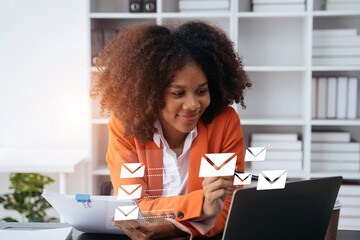 Businessman looking for laptop and thinking businessman reading emails on laptop in office.