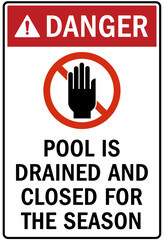 Pool closed sign and labels pool is drained and closed for the season