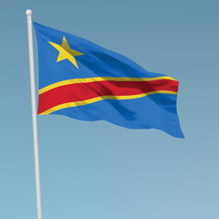 Waving flag of Democratic Republic of the Congo on flagpole. Template for independence day
