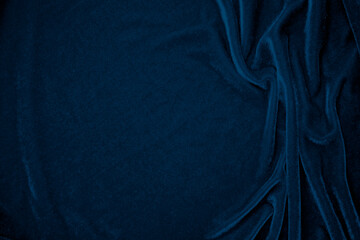 Blue velvet fabric texture used as background. Peacock color panne fabric background of soft and...