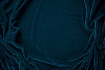 Blue velvet fabric texture used as background. Peacock color panne fabric background of soft and...