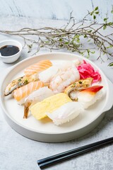 Fresh Japanese food sushi dishes on white plates