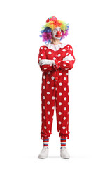 Full length portrait of a clown standing with folded arms - obrazy, fototapety, plakaty