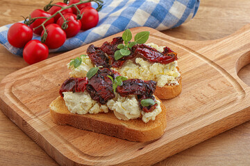 Bruschetta with soft cheese and tomato