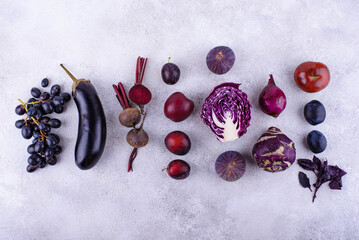 Assortment of purple vegetables and fruits
