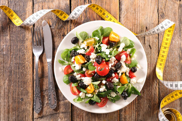 mixed vegetable salad in plate- diet food, health food, weight loss concept