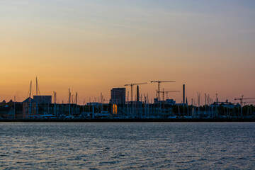 Fototapeta na wymiar Denmark - Aarhus city harbor front at sunset
