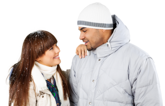 Happy young skiers couple embracing isolated on background
