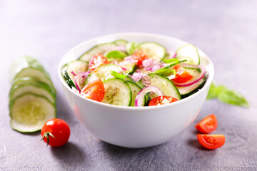 bowl of mixed cucumber salad