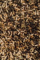 Empty spent ammunition casings in the box