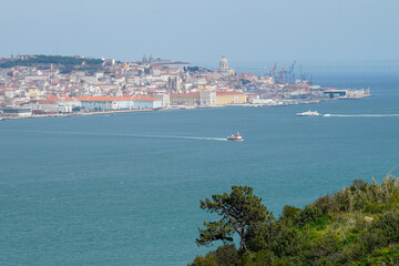 Lisbon, Portugal - March 2023: City view. Urban real estate and port