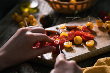 Various selection of tomatoes, brown, yellow, red and green. Sorted and arranged for baking.