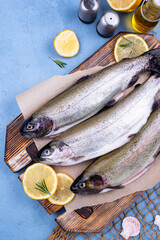 Raw uncooked trout with lemon