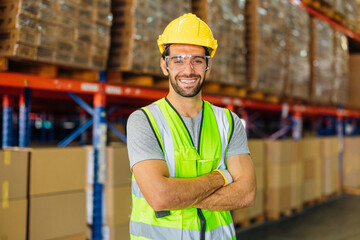 Warehouse workers using a digital tablet while recording inventory. Logistics employees working with warehouse management software in a large distribution centre.