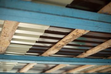 Roof from inside. Ceiling details. Chipped roof.