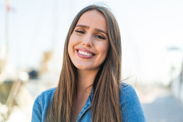 Young woman at outdoors . Portrait