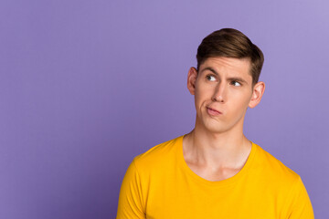 Photo of confused young person raise eyebrow look interested camera isolated on violet color background