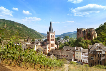 Fototapeta na wymiar view of beautiful ancient European German Bacharach city, Old Post Compound With Postenturm, Grape Escape Rhine Valley, slate roofs of old half-timbered houses, wine tourism in Rhineland-Palatinate
