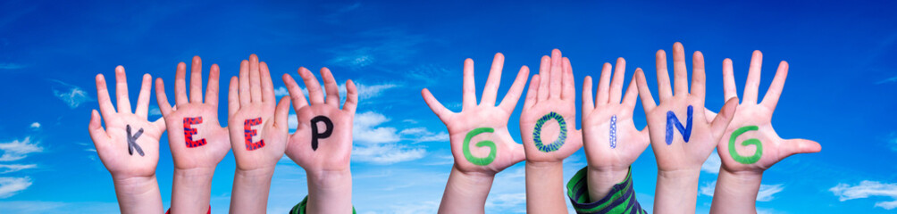 Children Hands Building Word Keep Going, Blue Sky