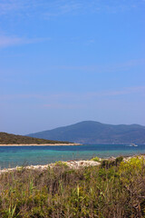 Fototapeta na wymiar Beautiful wild beach on Proizd, tiny island in southern Croatia.