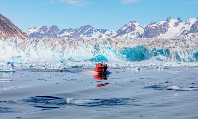 Fast moving motorboat trying to get out of the ice - Knud Rasmussen Glacier near Kulusuk - Greenland, East Greenland