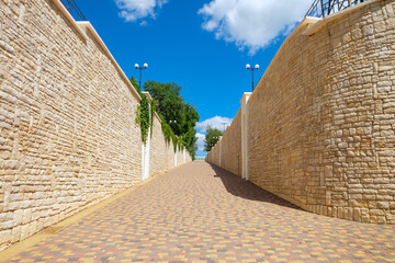 Ascent of stone Mountain (Kamennaya Gora) street in Zadonsk city with supporting stone retaining...