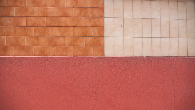 Muro de baldosa y pintura