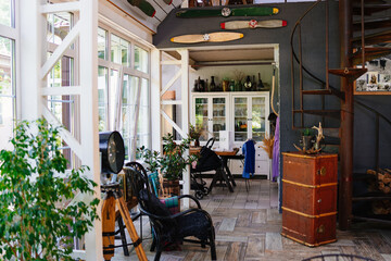 The interior of a country house in retro style with elements of antiques. 