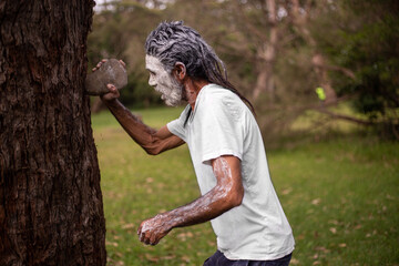 dharawal man explaining how sacred rocks were used by previous generations
