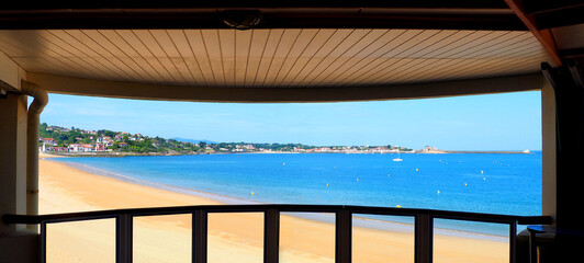 Panoramic view of the magnificent bay of Saint Jean de Luz, in the Basque country, from the terraces of the commercial gallery of the thalassotherapy center - obrazy, fototapety, plakaty