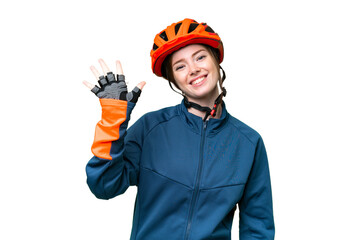 Young cyclist woman over isolated chroma key background counting five with fingers