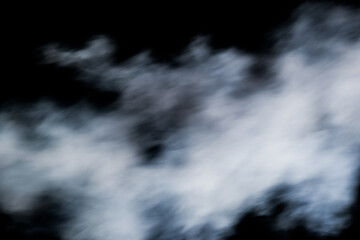 smoke spray fog mist motion air pattern on black background space for text for Halloween card template invitation flyer