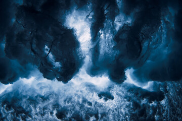 Ocean wave with foam, vortex underwater in transparent sea water.