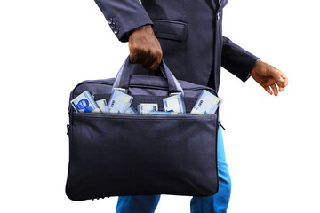 Black Businessman holding black bag full of stacks of Nigerian naira notes isolated on white...